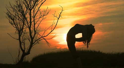 An arty photo of Jules in a backbend